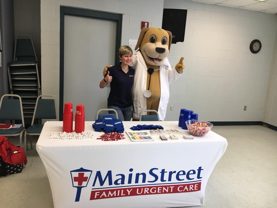 Dr. Wags and Community Educator Katie Strike a Pose at their booth at the City of Eufaula's Health Fair in April at ECC